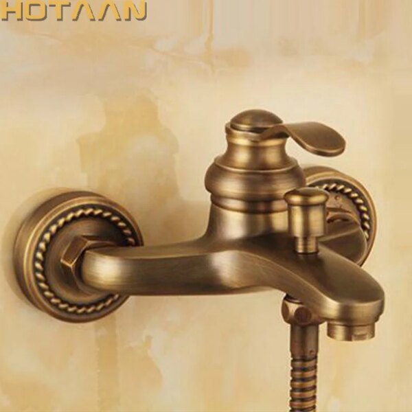 23577-bf8a6d.jpg Robinet mural en laiton antique tenu dans la main Kit de pommeau de douche