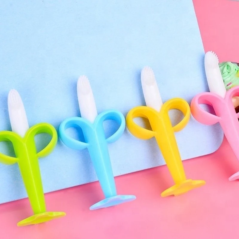 🍌 Brosse à dents bébé en silicone forme banane – Sécurité